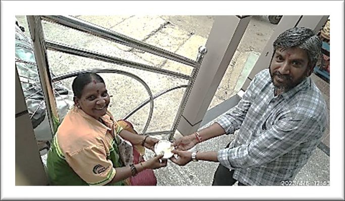 A meal being served to a woman on the street
